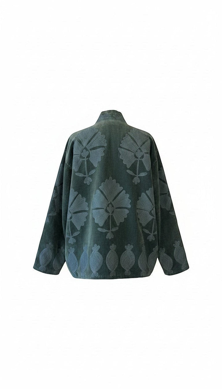 Indigo Haveli dark teal velvet jacket with tonal floral embroidery and a relaxed boxy fit, back view.