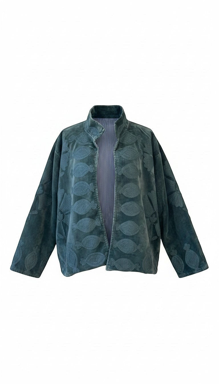 Indigo Haveli dark teal velvet jacket with tonal floral embroidery and a pinstriped interior lining.